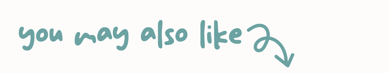 A teal handwritten-style arrow pointing down and to the right on a plain white background.